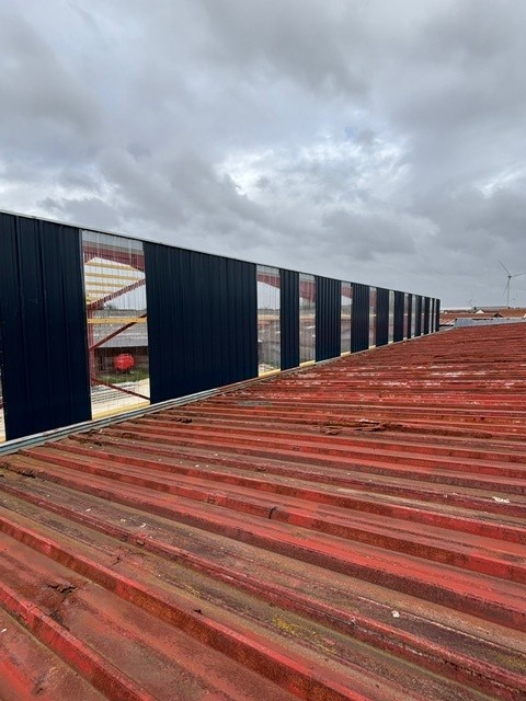 Pose bardage sur couverture existante